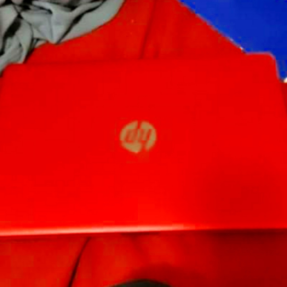 HP laptop 15.6 red pentium 4gb/128gb